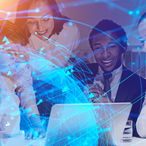 group of four people gathered around a laptop with a world overlay in light blue - data science